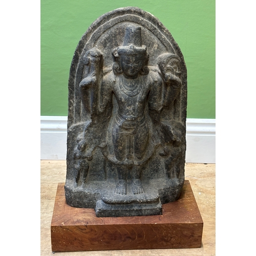 1243 - An Indian carved stone stele of the Hindu God Vishnu, possibly Pala dynasty, 45cmH excluding wooden ... 
