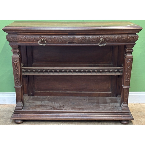 1270 - A late Victorian carved oak buffet, with recessed undershelf, 130x45x101cmH