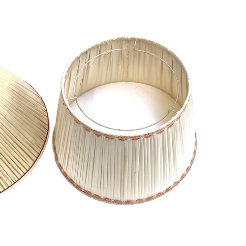 1286 - A large pleated silk shade with red stitched detail, 46cmD (23cm at top), together with one other, 4... 