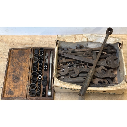 1271 - A quantity of vintage and even antique spanners, to include one adjustable, and a vintage socket set