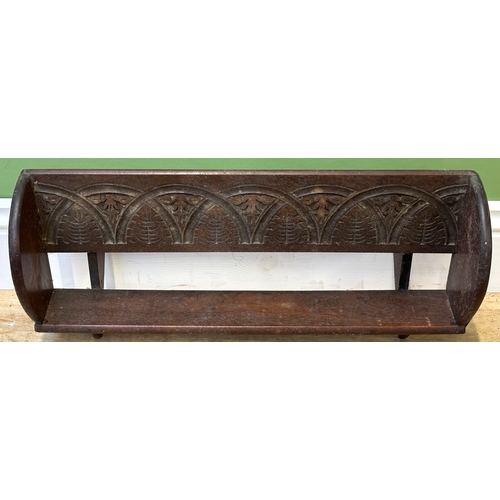 1304 - A carved book rack, 56cmW