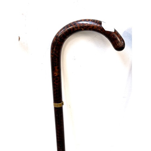 1138 - A quantity of walking sticks to include one made from Antelope horn, ash and hazel, an aluminium and... 