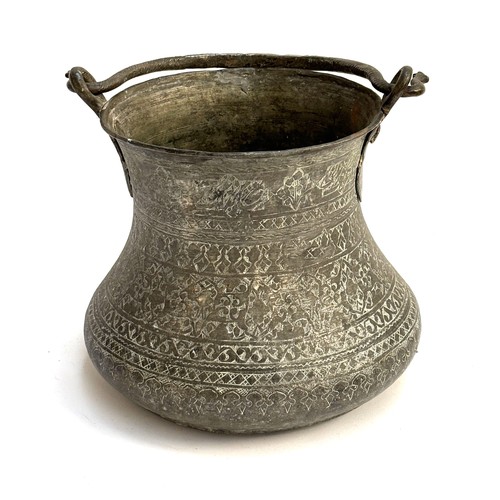 1070 - A chased Indian tinned copper bucket, 26cmH excluding carry handle