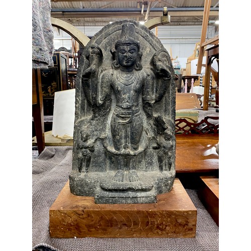 1243 - An Indian carved stone stele of the Hindu God Vishnu, possibly Pala dynasty, 45cmH excluding wooden ... 