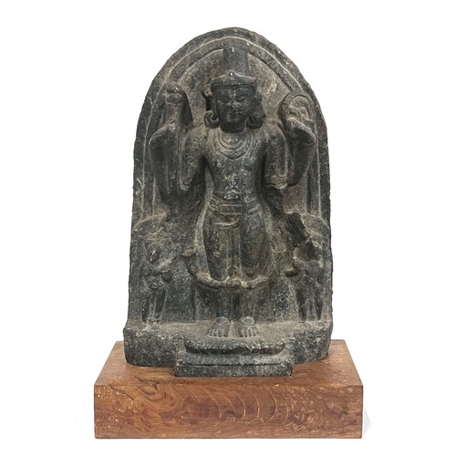 1243 - An Indian carved stone stele of the Hindu God Vishnu, possibly Pala dynasty, 45cmH excluding wooden ... 