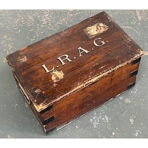 1361 - A pine trunk with metal bracing, the top monogrammed LRAG, 64x38.5x33cmH