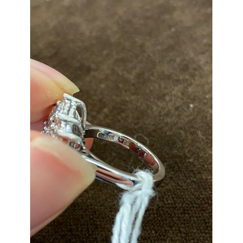 22 - A heavy 18ct white gold and diamond floral cluster ring, the diamonds each 3mmD and totalling approx... 
