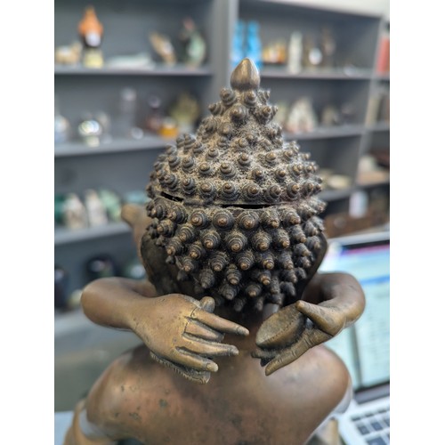 447 - A large early 20th century bronze Buddha Shakti tantric statue, engraved to base, 35cmH