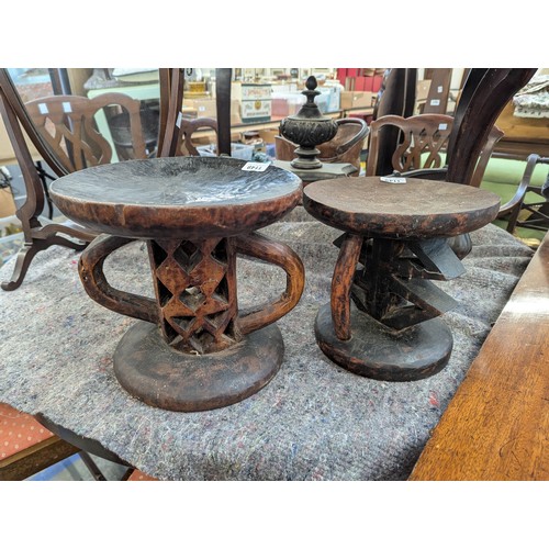 1149 - Two carved African tribal stools, possibly Tonga tribe, 23cmH and 26.5cmH