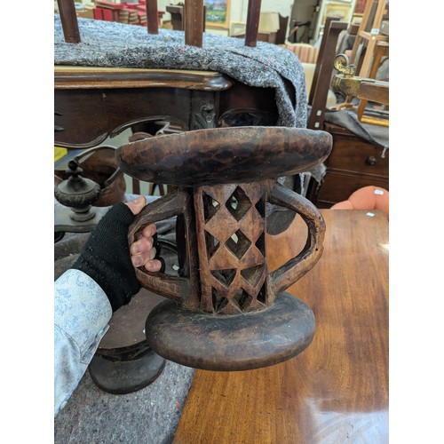 1149 - Two carved African tribal stools, possibly Tonga tribe, 23cmH and 26.5cmH