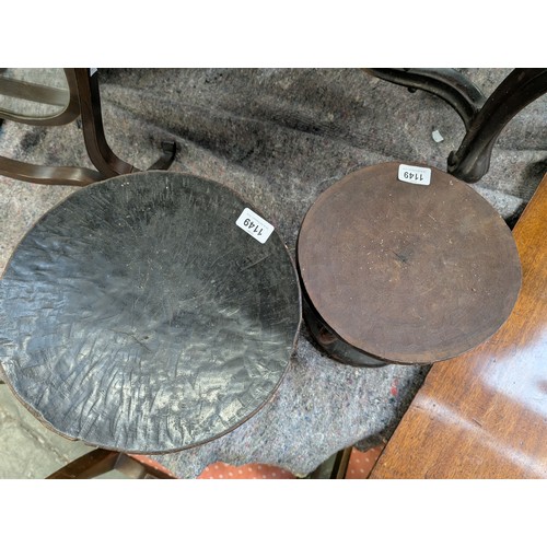 1149 - Two carved African tribal stools, possibly Tonga tribe, 23cmH and 26.5cmH
