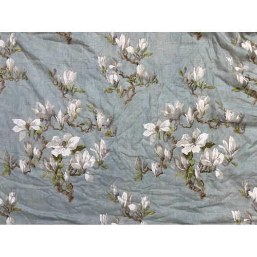 A pair of good quality lined and interlined curtains in a pale blue ...