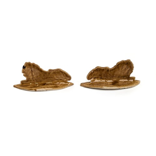 255 - A pair of 19th century Staffordshire lion figures, 17cmL 9cmH