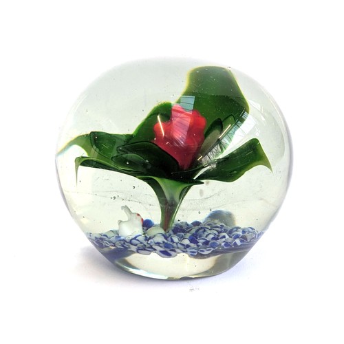 266 - A large glass paperweight containing a white rabbit under a flower, 10cmD