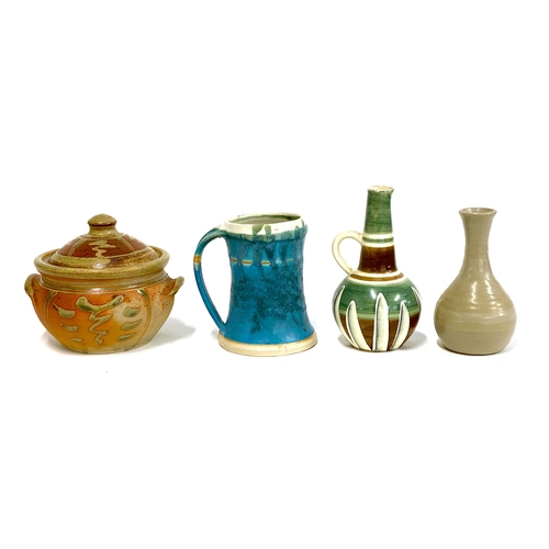 271 - A group of studio pottery to include a lidded pot, stamped N to base; blue glazed tankard, 14.5cmH; ... 