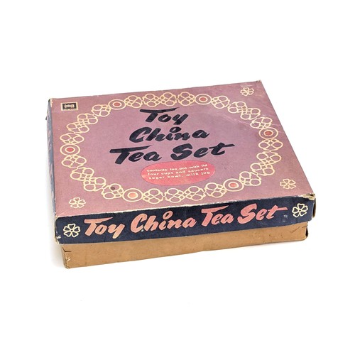 263 - A boxed 'Codeg' child's tea set, with settings for four
