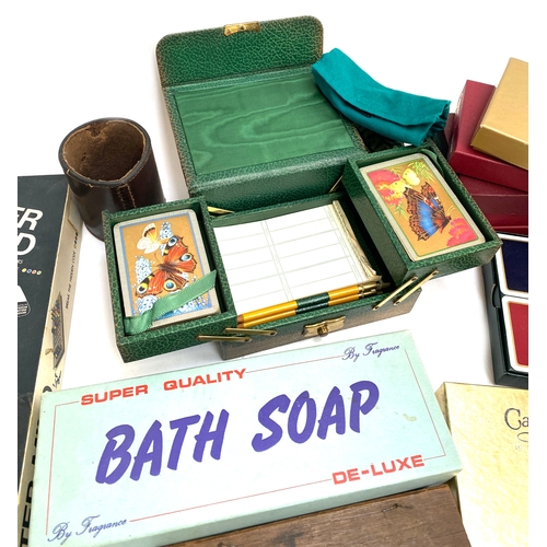 303 - A good collection of vintage playing cards and games etc