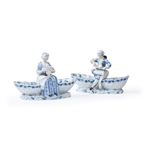 273 - A pair of 19th century Meissen double shell-shaped salt cellars or sweet meat dishes, one centrally ... 