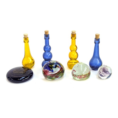 284 - Three handblown glass paperweights, vase 23cmH, a blue glass commemorative paperweight signed to bas... 