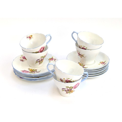 283 - A set of six Shelley florally painted cups, saucers, and side plates