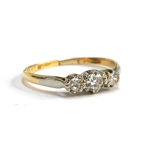 53 - An 18ct gold and diamond trilogy ring, the central diamond 3mmD, size P, 2.1g
