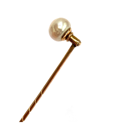 7 - A Victorian gold and pearl stickpin, the 8mm pearl likely natural, 2.4g