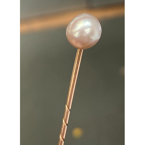7 - A Victorian gold and pearl stickpin, the 8mm pearl likely natural, 2.4g