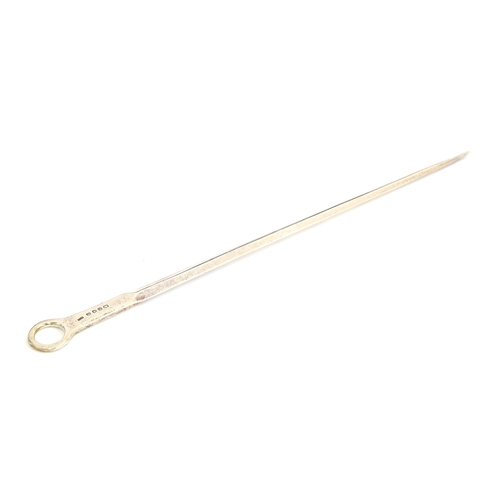 47 - A large George III silver meat skewer, maker's mark obscure, London 1805, with a loop handle, 35.7cm... 