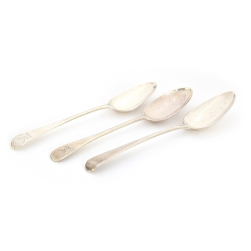 54 - Two Georgian and one later Old English pattern table spoons, one with plain terminal, London 1814, 6... 