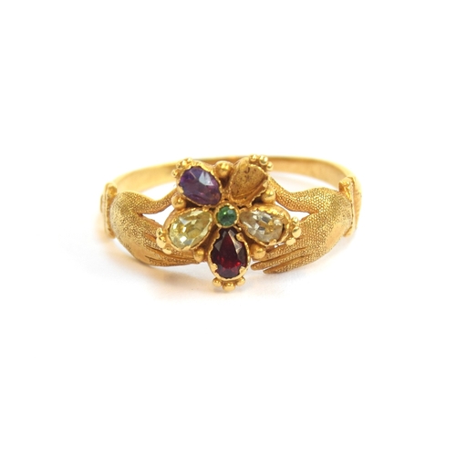 2 - A late Georgian gold pansy ring with fede form shoulders, the petals of the pansy set with amethysts... 