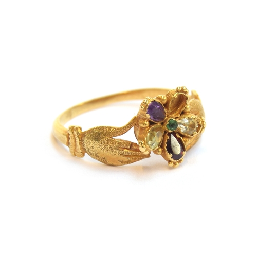2 - A late Georgian gold pansy ring with fede form shoulders, the petals of the pansy set with amethysts... 