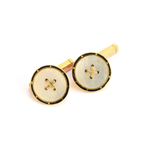 10 - A pair of Art Deco 18ct gold, mother of pearl and black enamel button form cufflinks, 1.4cm diameter... 