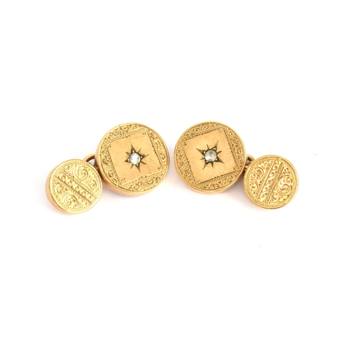 9 - A pair of Victorian 9ct gold and paste cufflinks with foliate engraved decoration, the larger panels... 