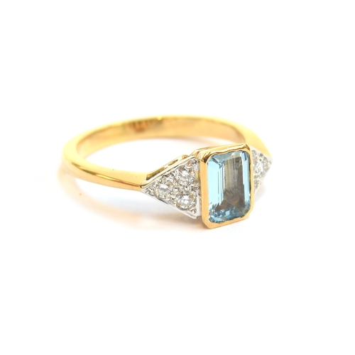 7 - An 18ct gold, aquamarine and diamond ring, the emerald cut aquamarine approx. 0.63ct, flanked by thr... 