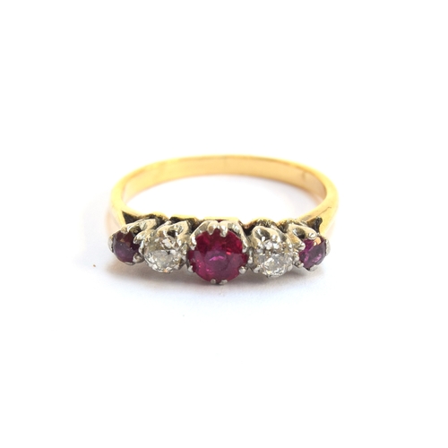 6 - An early 20th century 18ct gold, ruby and diamond five stone ring, the largest ruby 4.5mm diameter, ... 