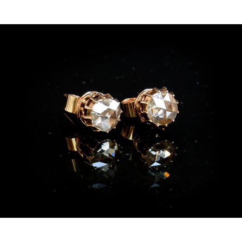 22 - A pair of 19th century late Georgian/early Victorian gold mounted rose cut diamond stud earrings, th... 