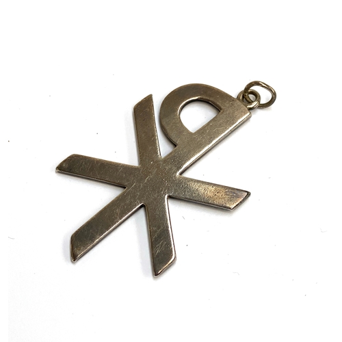 10 - A late 19th century silver aesthetic movement Chi Rho form pendant, engraved with Aesthetic movement... 