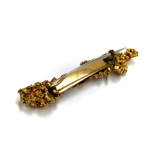 31 - A late 19th/early 20th century gold nugget brooch, 4.6cmW, gross weight 9.5g
