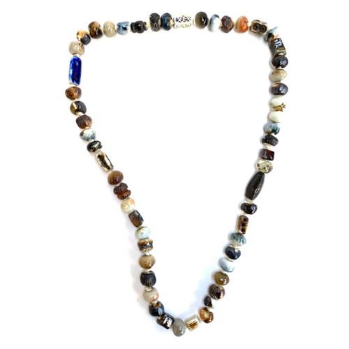 38 - A Guy and Joan Sydenham salt glazed pottery bead necklace, 41cmL