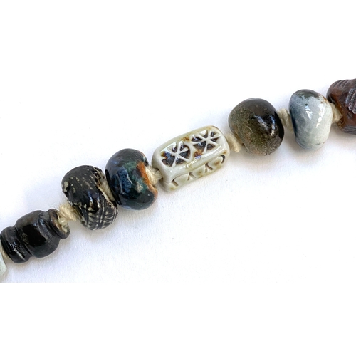38 - A Guy and Joan Sydenham salt glazed pottery bead necklace, 41cmL