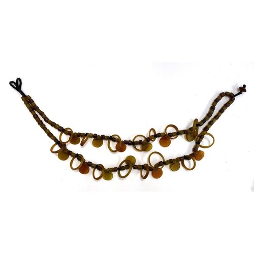40 - An impressive early-mid 20th century West African tribal necklace, likely originating from Mali, com... 
