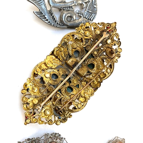 49 - An early 20th century Czech filigree buckle later converted for use a brooch; silver filigree bracel... 