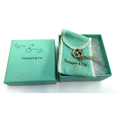 56 - A Tiffany & Co. Elsa Peretti 925 silver apple pendant on original chain, the pendant 1.5cmW