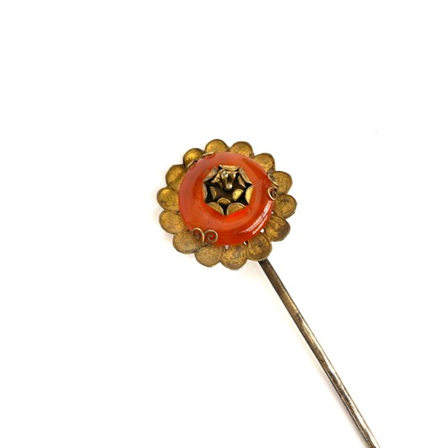 15 - A Chinese Qing dynasty gilt metal and carnelian floral hair pin, stamped with mark, 3.2cmW