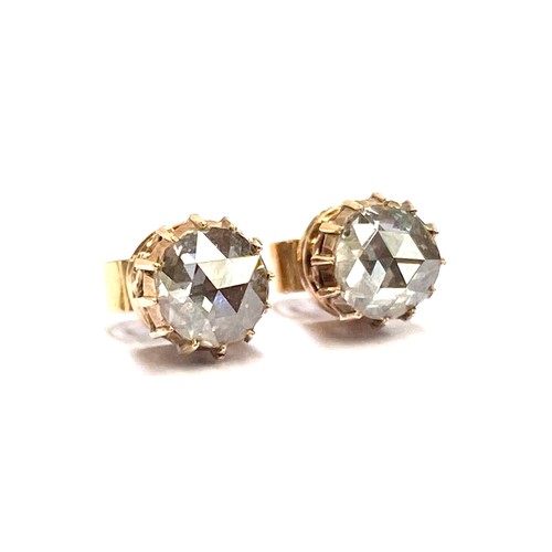 22 - A pair of 19th century late Georgian/early Victorian gold mounted rose cut diamond stud earrings, th... 