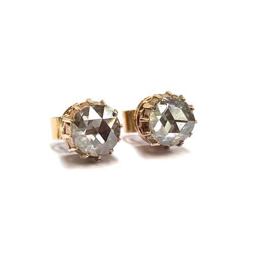 22 - A pair of 19th century late Georgian/early Victorian gold mounted rose cut diamond stud earrings, th... 
