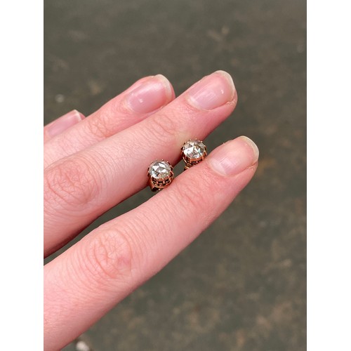 22 - A pair of 19th century late Georgian/early Victorian gold mounted rose cut diamond stud earrings, th... 