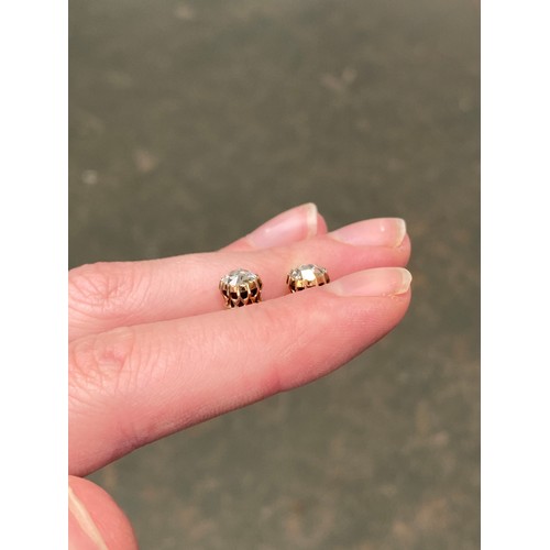 22 - A pair of 19th century late Georgian/early Victorian gold mounted rose cut diamond stud earrings, th... 