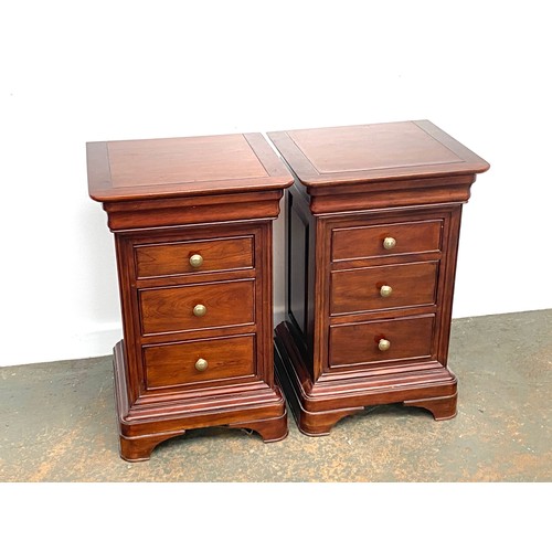 1056 - A smart pair of John Lewis wooden bedside cabinets of three drawers, on plinth base, 45x41.5x70cmH