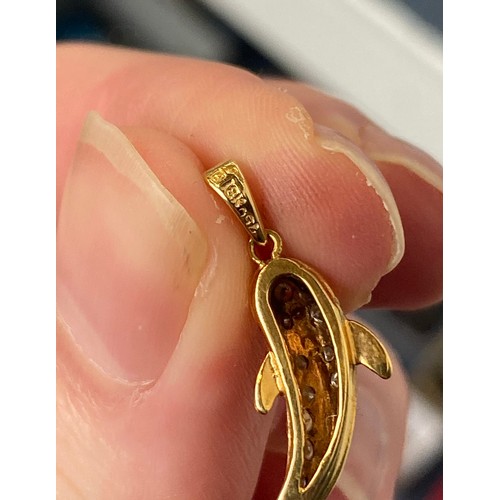 12 - An 18ct gold and diamond fish pendant, 2cmL, 1.9g